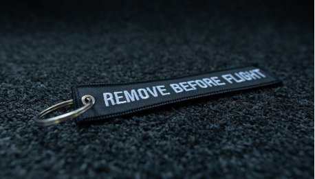 embroidered black 140x30 keychain