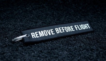 Black Woven Remove Before Flight Keyring 5.5x1.8