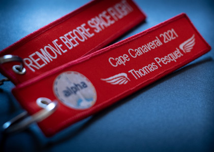 missionalpha remove before space flight key chain with zooming on next ISS Captain name : Thomas Pesquet