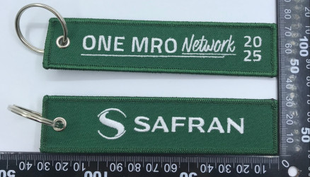 SAFRAN green keychain – Corporate branding – June 2025
